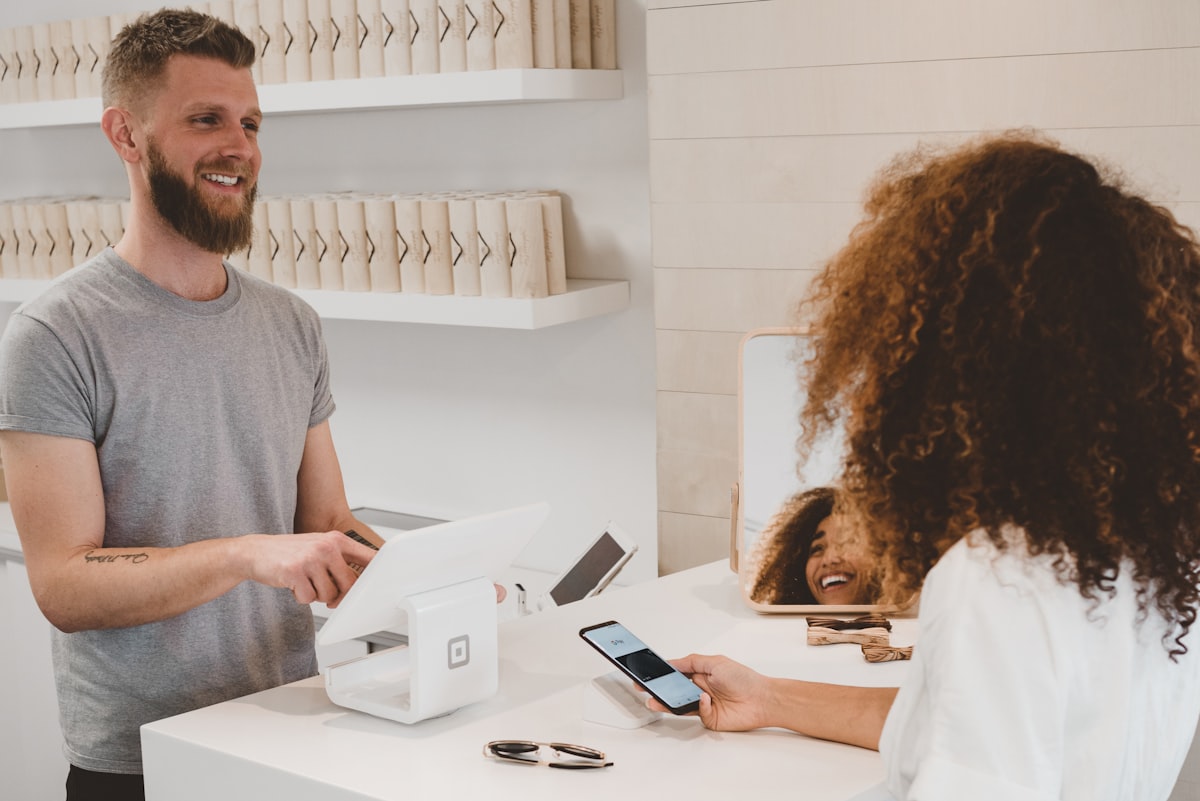 Person using credit card for online shopping