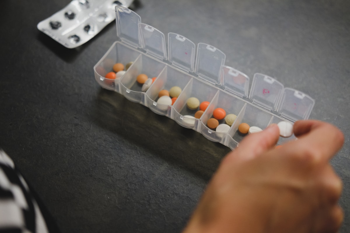 Pharmaceutical technician inspecting production