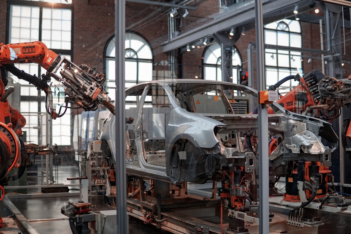 Robotic arms on automated factory line